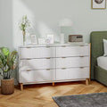 Commode double 6 tiroirs à façades cannelées, poignées dorées, cinq pieds en bois, blanche