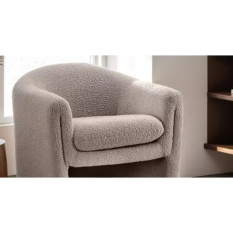 Fauteuil d'appoint en bouclette de forme incurvée avec accoudoirs arrondis